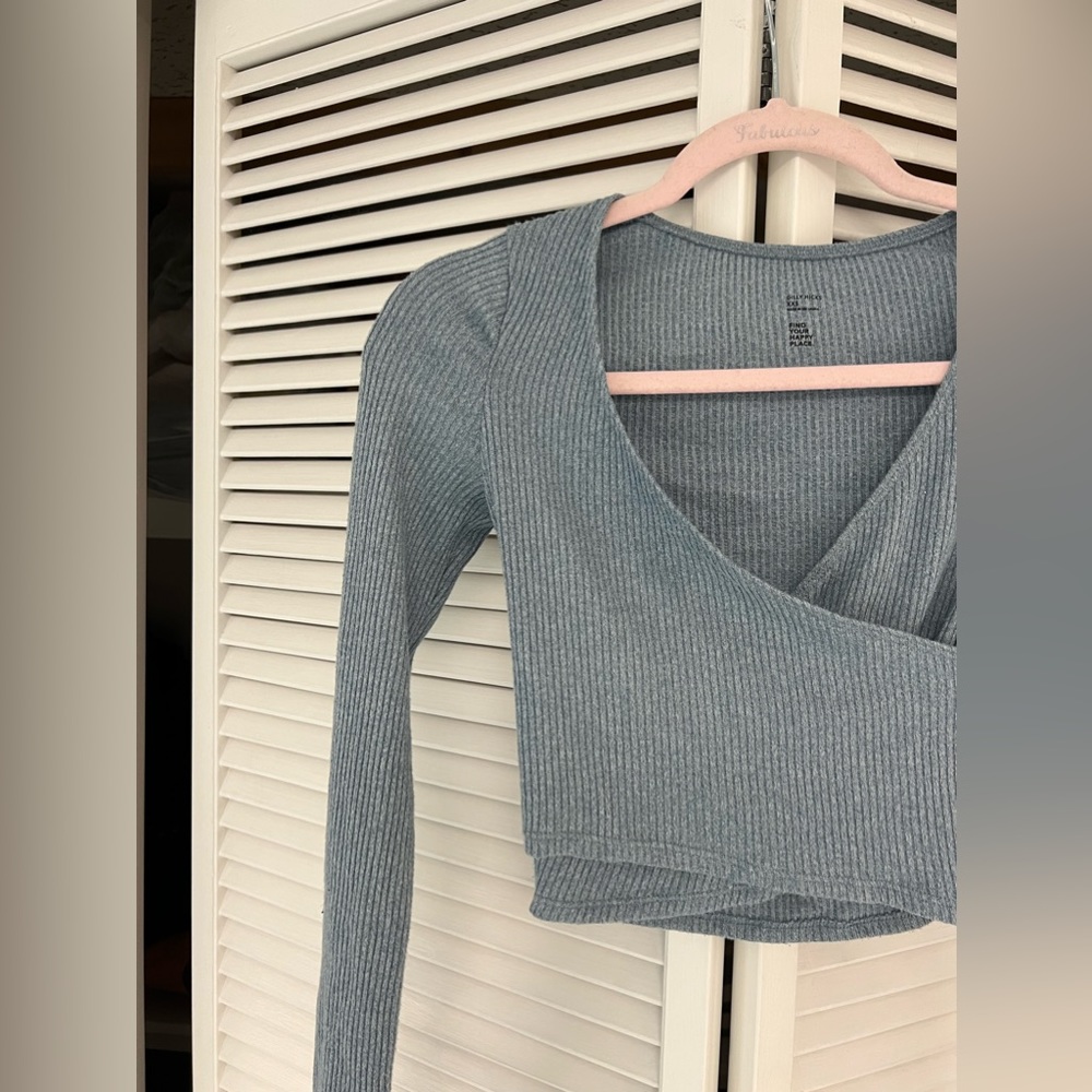 light blue/grey cross front cropped long sleeve shirt size xs